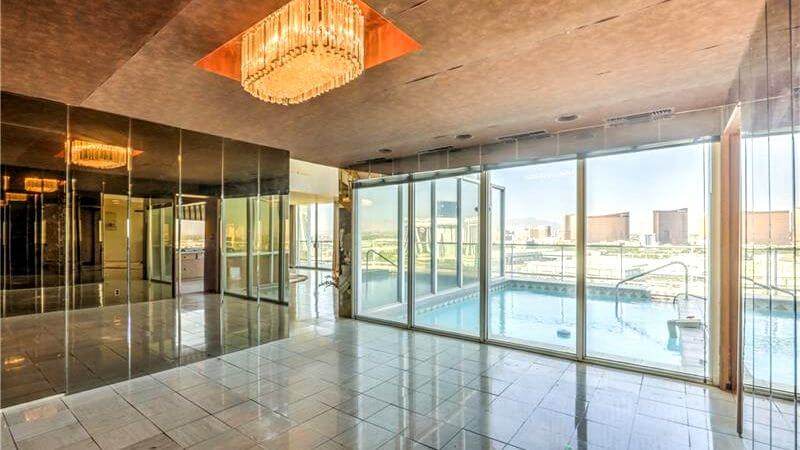 Mirrored walls in a vintage Regency Towers condo for rent in Las Vegas